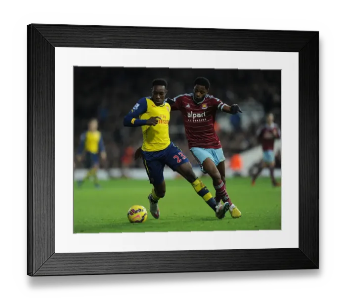 Framed Print : Clash at the Boleyn: Welbeck vs. Song in the West Ham United vs. Arsenal Premier League Battle Framed Print : Clash at the Boleyn: Welbeck vs. Song in the West Ham United vs. Arsenal Premier League Battle