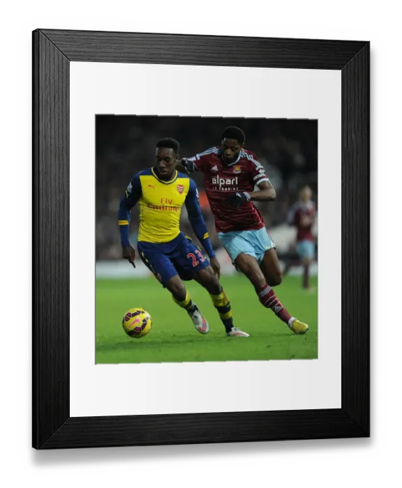 Framed Print : Intense Rivalry: Welbeck vs. Song Clash in West Ham United vs. Arsenal (2014-15)