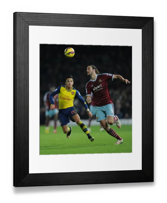 Framed Print : Clash at the Boleyn: Sanchez vs. Carroll in the 2014-15 West Ham United vs. Arsenal Premier League Battle Framed Print : Clash at the Boleyn: Sanchez vs. Carroll in the 2014-15 West Ham United vs. Arsenal Premier League Battle