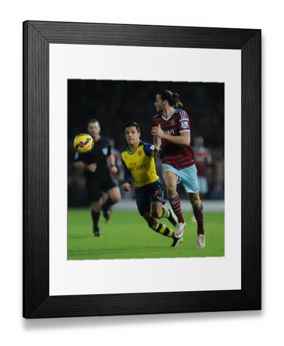 Framed Print : Sanchez vs. Carroll: A Premier League Battle at Boleyn Ground