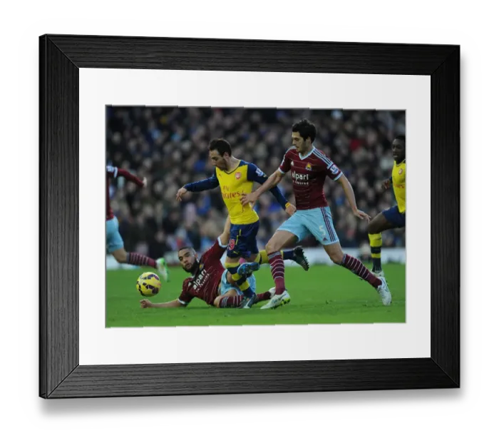 Framed Print : Arsenal's Santi Cazorla Wins Penalty Against West Ham United in Premier League Clash