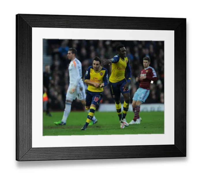 Framed Print : Cazorla and Welbeck Celebrate Arsenal's First Goal Against West Ham United (2014-15) Framed Print : Cazorla and Welbeck Celebrate Arsenal's First Goal Against West Ham United (2014-15)