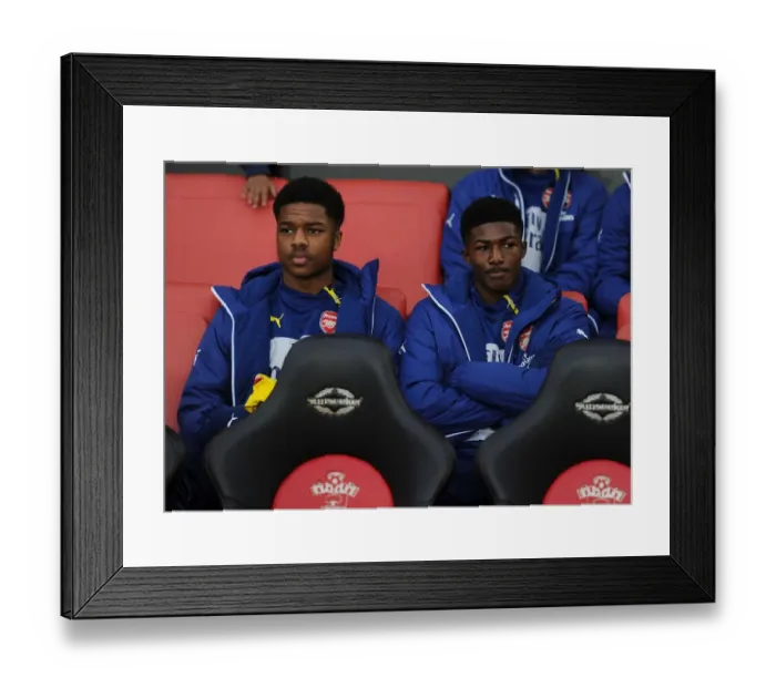 Framed Print : Arsenal Substitutes: Akpom and Maitland-Niles Prepare for Southampton Clash (Premier League, 2014-15)
