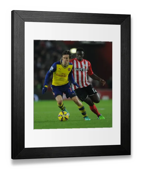 Framed Print : Arsenal's Rosicky Outmaneuvers Southampton's Wanyama in Premier League Clash (Southampton v Arsenal 2014-15)
