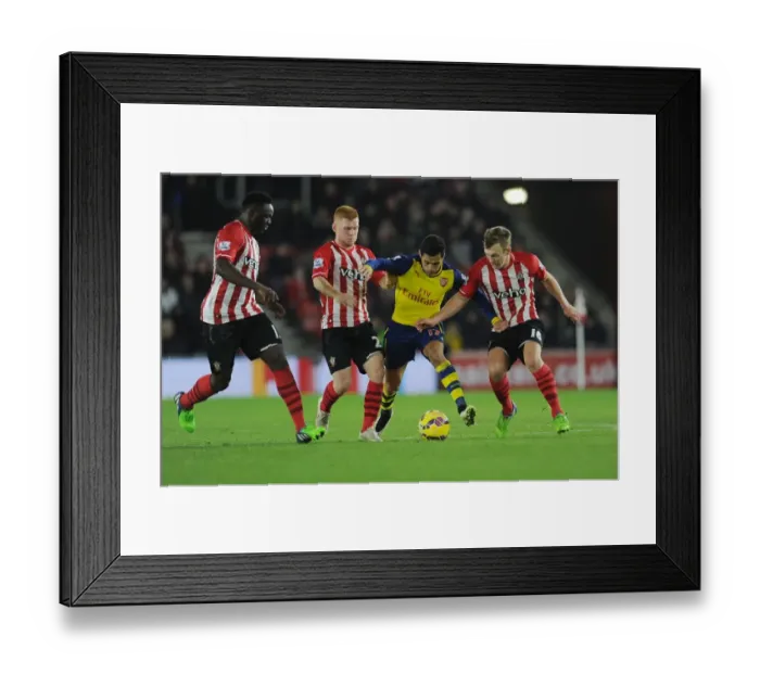 Framed Print : Sanchez vs. Southampton Trio: Intense Clash at St. Mary's