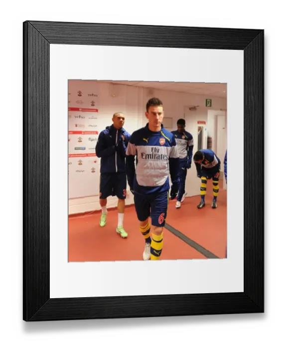 Framed Print : Arsenal's Koscielny in the Tunnel: Focus and Determination Before Southampton Showdown (2014-15)