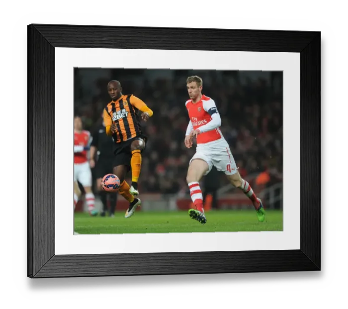 Framed Print : Per Mertesacker vs. Yannick Sagbo: Arsenal vs. Hull City FA Cup Clash Framed Print : Per Mertesacker vs. Yannick Sagbo: Arsenal vs. Hull City FA Cup Clash