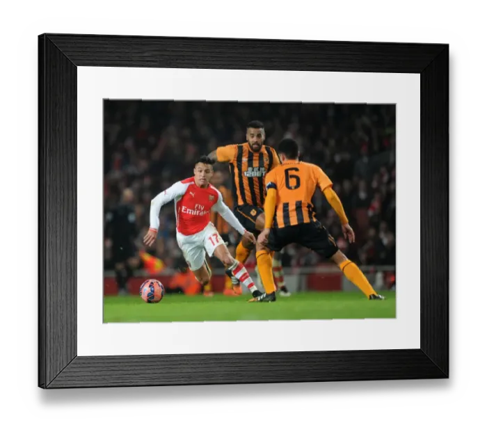 Framed Print : Arsenal's Alexis Sanchez Faces Off Against Hull City's Tom Huddlestone and Curtis Davies in FA Cup Clash Framed Print : Arsenal's Alexis Sanchez Faces Off Against Hull City's Tom Huddlestone and Curtis Davies in FA Cup Clash