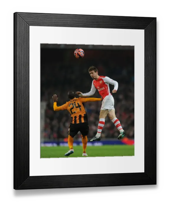 Framed Print : Arsenal vs Hull City: Monreal Leaps Ahead in FA Cup Clash Framed Print : Arsenal vs Hull City: Monreal Leaps Ahead in FA Cup Clash