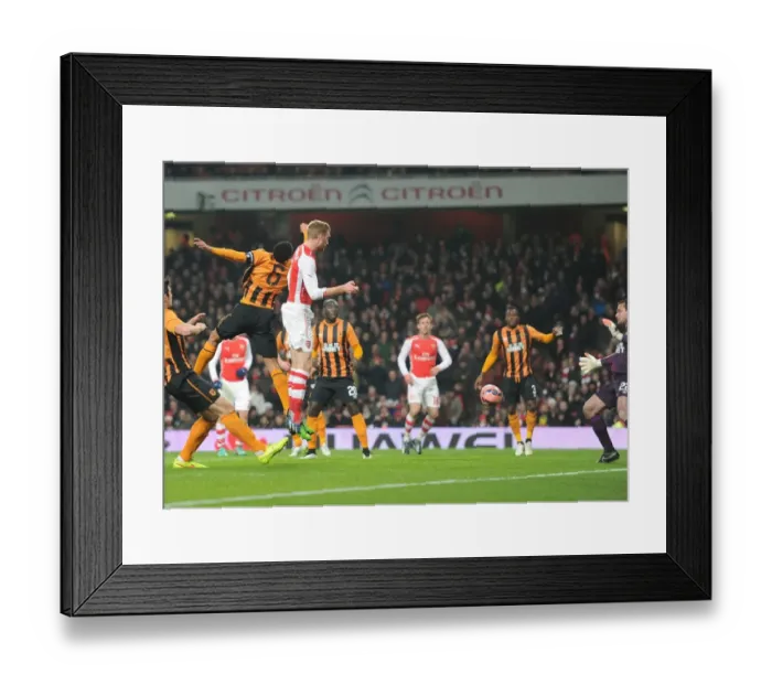 Framed Print : Arsenal's FA Cup Triumph: Per Mertesacker's Header Against Hull City (January 2015) Framed Print : Arsenal's FA Cup Triumph: Per Mertesacker's Header Against Hull City (January 2015)