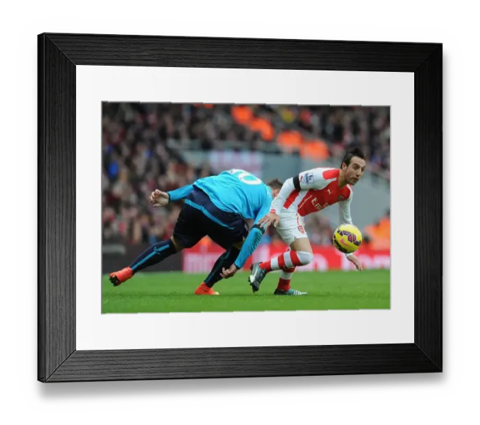 Framed Print : Arsenal's Santi Cazorla Evades Marko Arnautovic's Challenge in Thrilling Arsenal vs Stoke Showdown Framed Print : Arsenal's Santi Cazorla Evades Marko Arnautovic's Challenge in Thrilling Arsenal vs Stoke Showdown