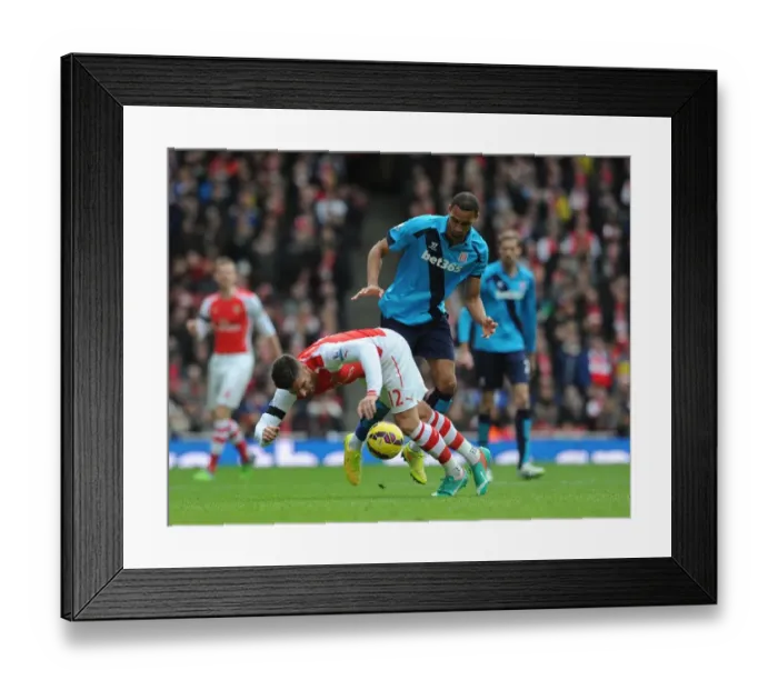 Framed Print : Arsenal's Olivier Giroud Fouled by Stoke's Steven Nzonzi in Premier League Clash Framed Print : Arsenal's Olivier Giroud Fouled by Stoke's Steven Nzonzi in Premier League Clash