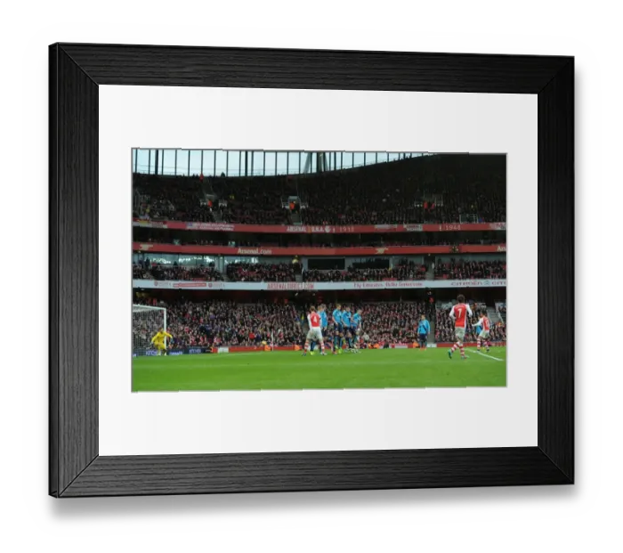 Framed Print : Alexis Sanchez's Double Strike: Arsenal's Free-Kick Victory Over Stoke City (2014-15) Framed Print : Alexis Sanchez's Double Strike: Arsenal's Free-Kick Victory Over Stoke City (2014-15)