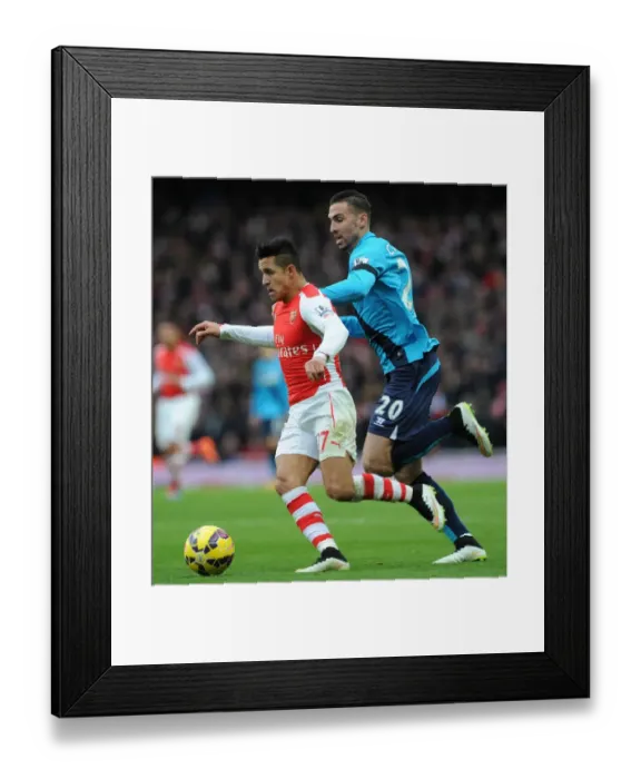Framed Print : Intense Face-Off: Alexis Sanchez vs. Geoff Cameron - Arsenal's Battle Against Stoke City
