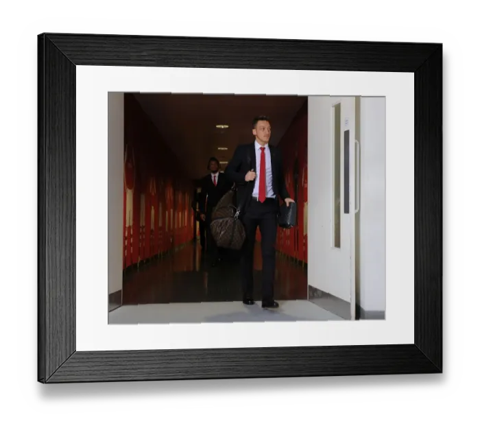 Framed Print : Mesut Ozil Heads to the Arsenal Dressing Room before Arsenal vs Stoke City, Premier League 2014-15 Framed Print : Mesut Ozil Heads to the Arsenal Dressing Room before Arsenal vs Stoke City, Premier League 2014-15