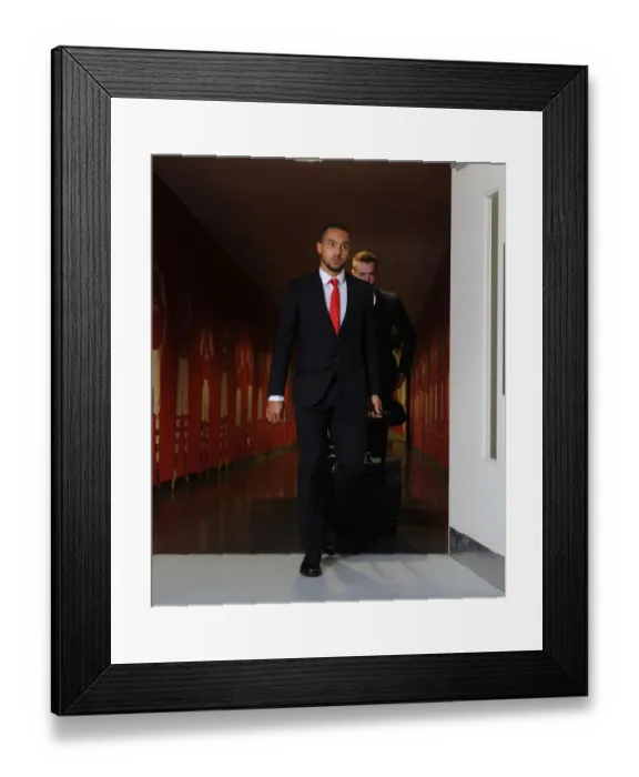 Framed Print : Theo Walcott Heads to the Arsenal Changing Room before Arsenal vs Stoke City, Premier League 2014-15