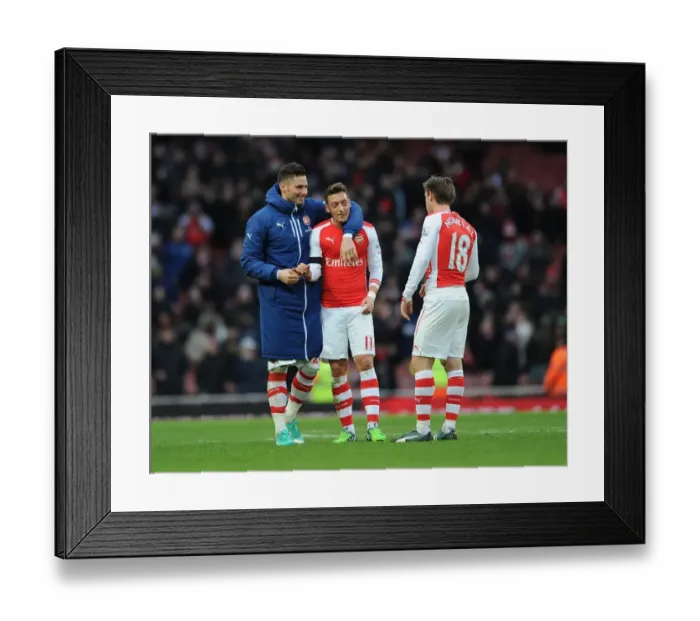 Framed Print : Arsenal's Ozil, Giroud, and Monreal: United in Action against Stoke City (2014-15) Framed Print : Arsenal's Ozil, Giroud, and Monreal: United in Action against Stoke City (2014-15)