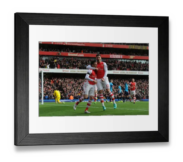 Framed Print : Arsenal's Laurent Koscielny and Olivier Giroud Celebrate Goal Against Stoke City (2014-15)