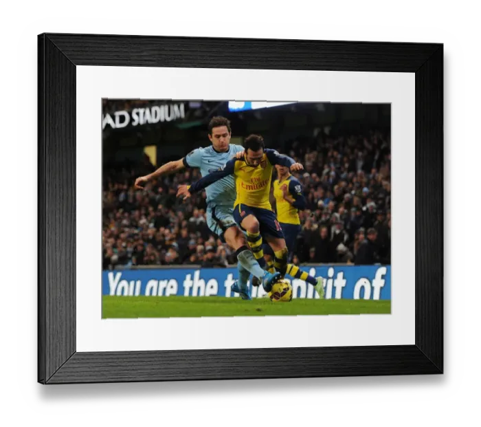Framed Print : Clash of the Midfield Maestros: Cazorla vs. Lampard - Manchester City vs. Arsenal, Premier League 2014-15: A Battle at the Heart of the Pitch Framed Print : Clash of the Midfield Maestros: Cazorla vs. Lampard - Manchester City vs. Arsenal, Premier League 2014-15: A Battle at the Heart of the Pitch