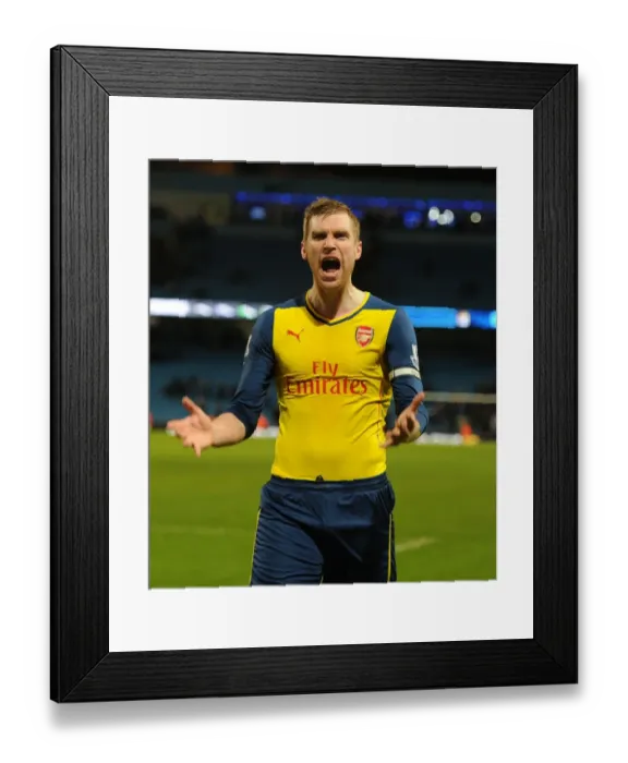 Framed Print : Per Mertesacker Celebrates Arsenal's Victory Over Manchester City - Premier League 2014-15 Framed Print : Per Mertesacker Celebrates Arsenal's Victory Over Manchester City - Premier League 2014-15