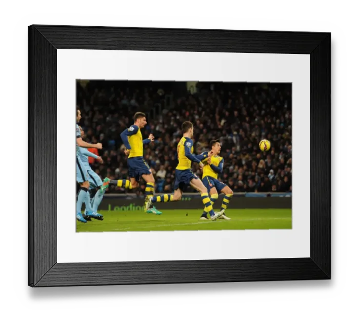 Framed Print : Olivier Giroud Scores Arsenal's Stunning Goal Against Manchester City (2014-15) Framed Print : Olivier Giroud Scores Arsenal's Stunning Goal Against Manchester City (2014-15)