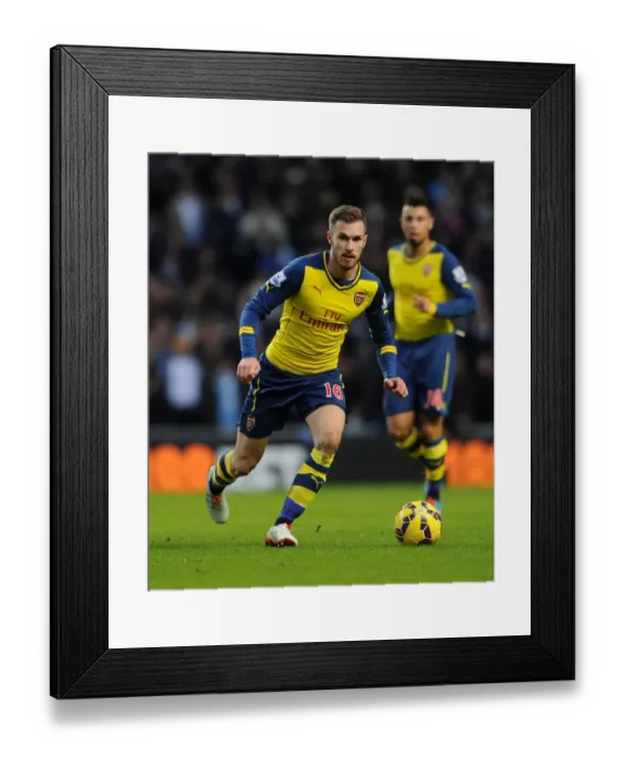 Framed Print : Aaron Ramsey in Action: Manchester City vs. Arsenal, Premier League 2014-15