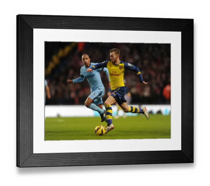 Framed Print : Ramsey Outruns Fernando: Manchester City vs Arsenal, Premier League Showdown (2015) Framed Print : Ramsey Outruns Fernando: Manchester City vs Arsenal, Premier League Showdown (2015)