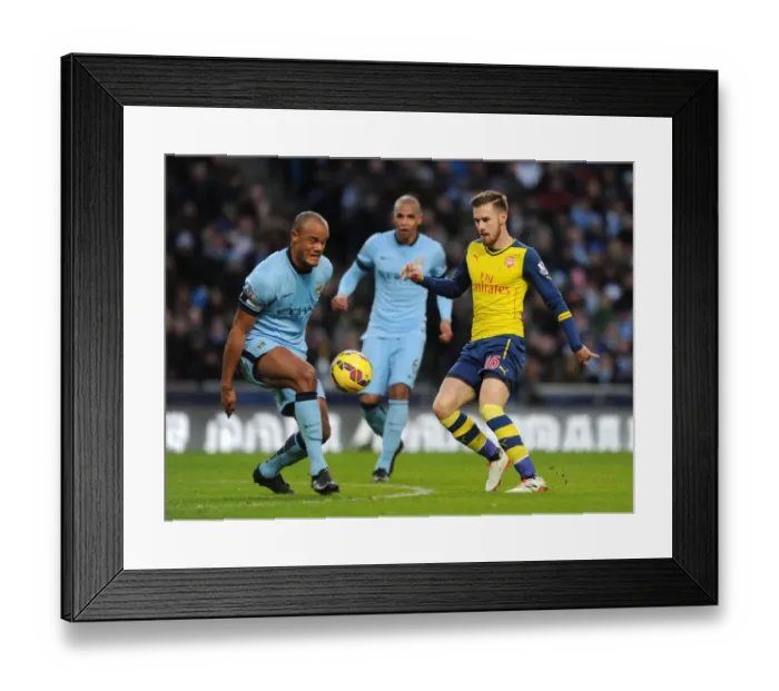 Framed Print : Clash of Midfield Titans: Ramsey vs. Kompany - Manchester City vs. Arsenal, Premier League Framed Print : Clash of Midfield Titans: Ramsey vs. Kompany - Manchester City vs. Arsenal, Premier League