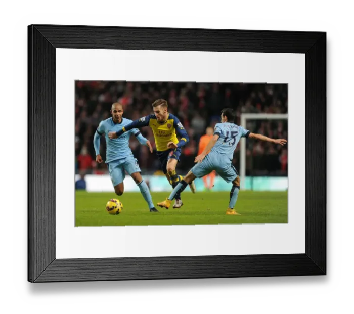 Framed Print : Aaron Ramsey Outmaneuvers Jesus Navas and Fernando: Manchester City vs Arsenal, Premier League 2014-15 (Photo) Framed Print : Aaron Ramsey Outmaneuvers Jesus Navas and Fernando: Manchester City vs Arsenal, Premier League 2014-15 (Photo)