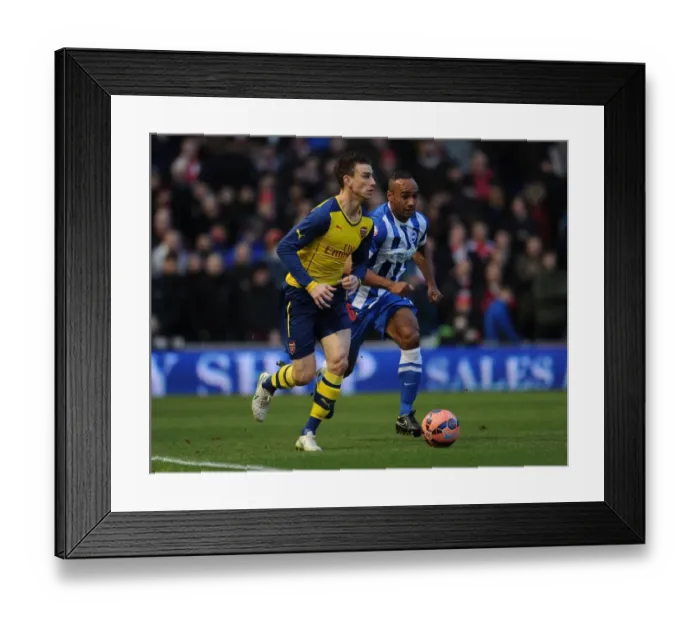 Framed Print : Laurent Koscielny Outmuscles Chris O'Grady in FA Cup Clash: Brighton vs Arsenal Framed Print : Laurent Koscielny Outmuscles Chris O'Grady in FA Cup Clash: Brighton vs Arsenal