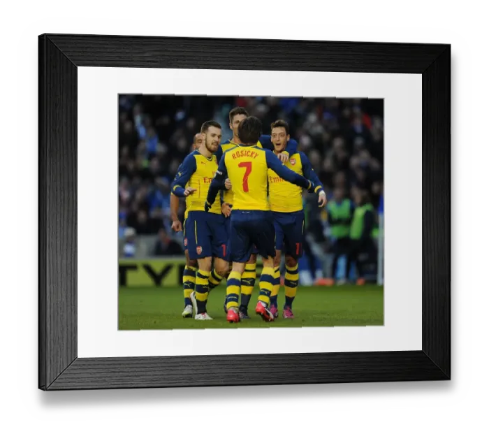 Framed Print : Mesut Ozil and Teammates Celebrate Goal Against Brighton & Hove Albion in FA Cup Fourth Round