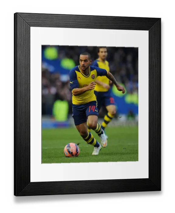 Framed Print : Theo Walcott's Brilliant Performance: Arsenal Triumphs Over Brighton & Hove Albion in FA Cup Showdown
