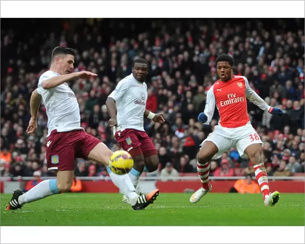 Chuba Akpom (Arsenal) Ciaran Clark (Villa). Arsenal 5: 0 Aston Villa. Barclays Premier League
