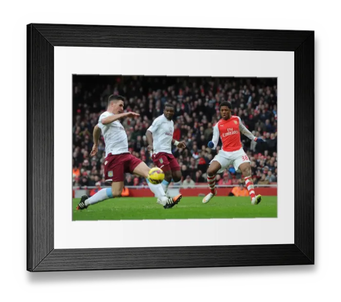 Framed Print : Chuba Akpom (Arsenal) Ciaran Clark (Villa). Arsenal 5: 0 Aston Villa. Barclays Premier League Framed Print : Chuba Akpom (Arsenal) Ciaran Clark (Villa). Arsenal 5: 0 Aston Villa. Barclays Premier League