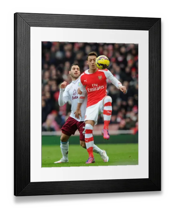 Framed Print : Mesut Ozil (Arsenal) Carles Gil (Villa). Arsenal 5: 0 Aston Villa. Barclays Premier League