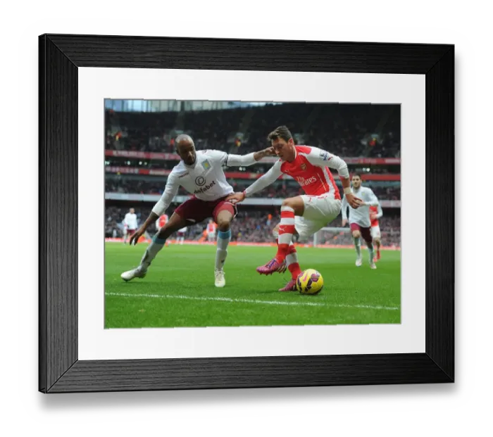Framed Print : Mesut Ozil vs Fabian Delph: A Battle at Emirates Stadium (Arsenal v Aston Villa, 2014-15)