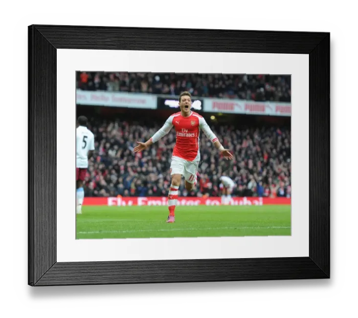 Framed Print : Mesut Ozil's Decisive Goal: Arsenal's Victory over Aston Villa, Premier League 2014-15