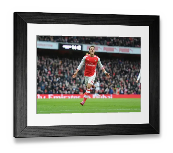 Framed Print : Mesut Ozil's Decisive Strike: Arsenal's Victory over Aston Villa, Premier League 2014-15 Framed Print : Mesut Ozil's Decisive Strike: Arsenal's Victory over Aston Villa, Premier League 2014-15