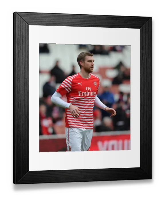 Framed Print : Arsenal's Per Mertesacker Before Arsenal vs Aston Villa, Premier League 2014-15
