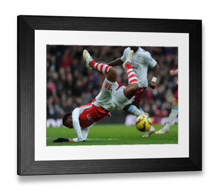 Framed Print : Arsenal vs Aston Villa: Akpom Wins Controversial Penalty in Premier League Clash