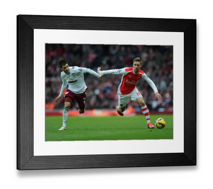 Framed Print : Monreal vs. Gil: Intense Battle at Emirates Stadium - Arsenal v Aston Villa, Premier League 2014-15 Framed Print : Monreal vs. Gil: Intense Battle at Emirates Stadium - Arsenal v Aston Villa, Premier League 2014-15