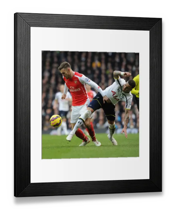 Framed Print : Intense Rivalry: Ramsey Foul - Tottenham vs. Arsenal, Premier League 2014-15