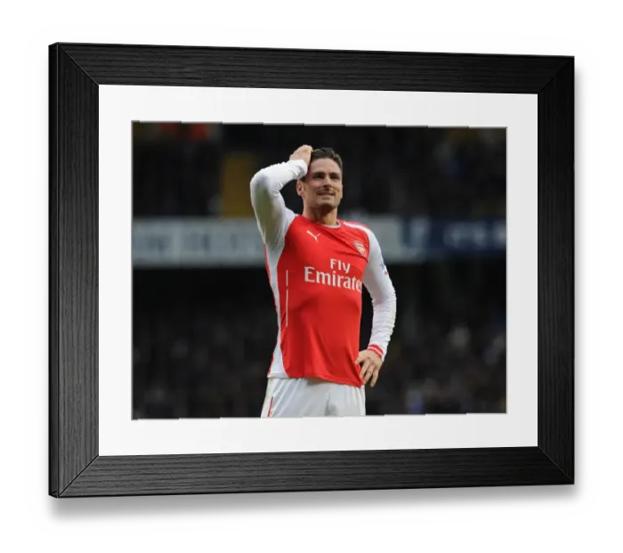 Framed Print : Olivier Giroud Faces Off Against Tottenham Hotspur in the 2014-15 Premier League Clash Framed Print : Olivier Giroud Faces Off Against Tottenham Hotspur in the 2014-15 Premier League Clash