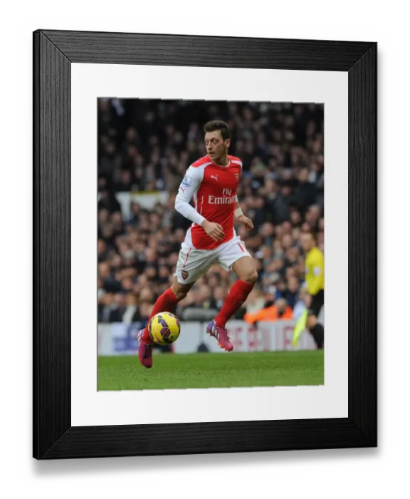 Framed Print : Mesut Ozil: In Action Against Tottenham in the 2014-15 Premier League