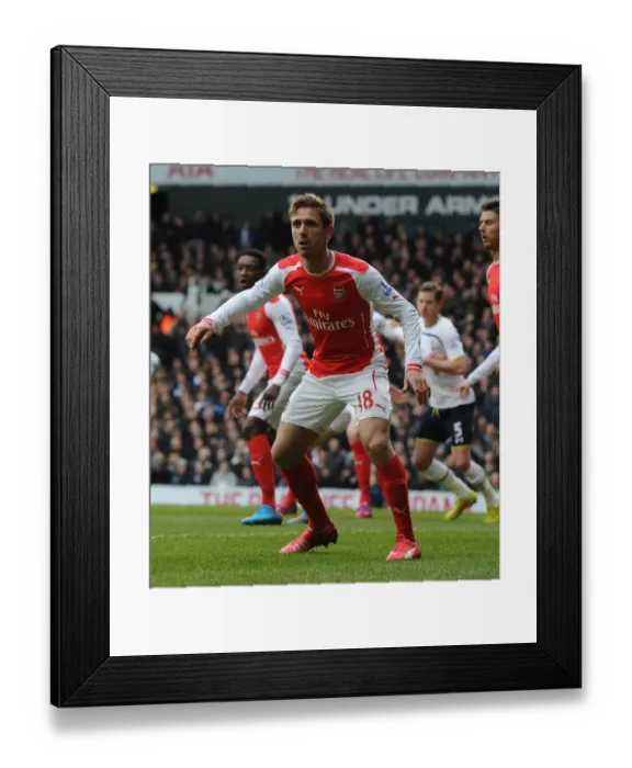 Framed Print : Nacho Monreal Focuses in Arsenal's Battle at White Hart Lane (Tottenham Hotspur vs Arsenal, Premier League 2014-15)