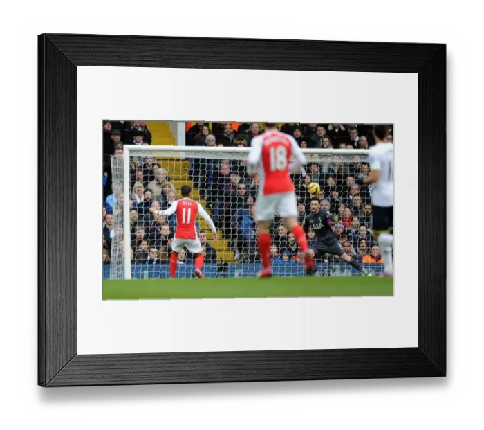 Framed Print : Mesut Ozil's Derby-Winning Goal: Arsenal Triumphs Over Tottenham, Premier League 2014-15