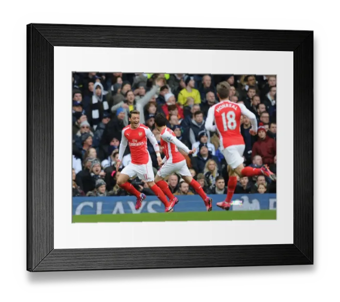 Framed Print : Mesut Ozil and Santi Cazorla Celebrate Goal: Tottenham vs. Arsenal, Premier League 2014-15