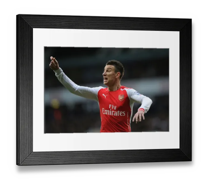 Framed Print : Arsenal's Laurent Koscielny in Action Against Tottenham Hotspur - Premier League 2014-15