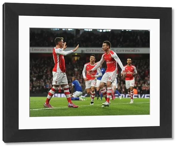 Arsenal's Koscielny and Ozil Celebrate First Goal Against Leicester City (2014-15)