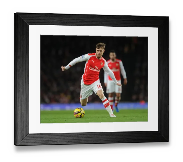 Framed Print : Aaron Ramsey in Action: Arsenal vs Leicester City, Premier League 2014-15 Framed Print : Aaron Ramsey in Action: Arsenal vs Leicester City, Premier League 2014-15